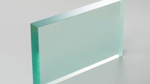  Transparent plastic sheet panel with green-tinted edges on a light background.