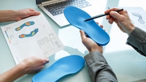 Discover the benefits of custom orthopedic insoles. Improve your foot health and comfort today.