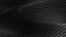 Shiny Carbon fiber wave background composite. Carbon fibre flowing material. 3D illustration