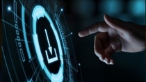 Hand reaching toward a digital touchscreen interface with a glowing download icon surrounded by futuristic circular UI elements. Hand reaching toward a digital touchscreen interface with a glowing download icon surrounded by futuristic circular UI elements.