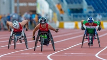 Raymond Martin from the USA (center) wins the Gold medal in the Men's 100m T52 Final with 17.01 during the 2015 Toronto Parapan Am Games Raymond Martin from the USA (center) wins the Gold medal in the Men's 100m T52 Final with 17.01 during the 2015 Toronto Parapan Am Games