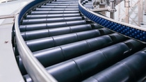 Crossing of the roller conveyor, Production line conveyor roller transportation objects. Crossing of the roller conveyor, Production line conveyor roller transportation objects.