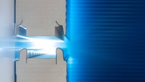 A close-up image of BASF Elastopir® tongue-and-groove insulation material with illuminated blue layers, highlighting advanced thermal insulation and precision engineering. A close-up image of BASF Elastopir® tongue-and-groove insulation material with illuminated blue layers, highlighting advanced thermal insulation and precision engineering.