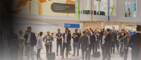 K2025 Header with People visiting BASF's booth at K fair