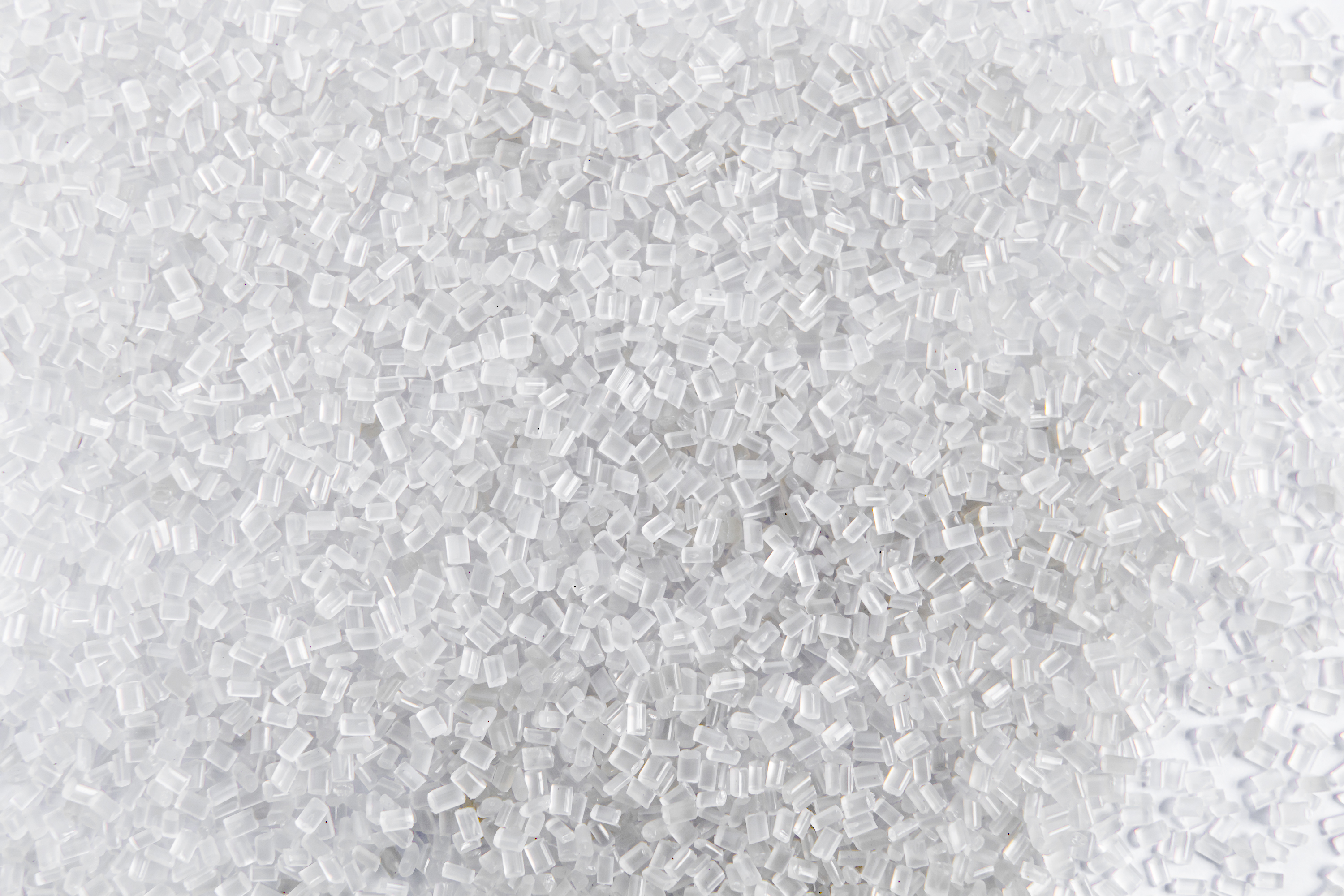 Polypropylene granule close-up background texture. plastic resin ( Masterbatch).Grey chemical granules for industrial plastic production; Shutterstock ID 1690090318; purchase_order: BASF_PC-002509; job: Plastic Additives Website; client: BASF Plastic Additives; other: Katharina Weber